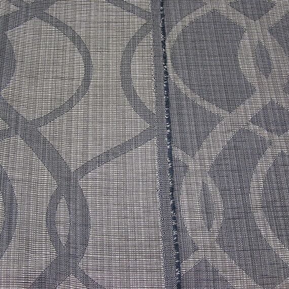 Propletené vlny hnědo-hnědé